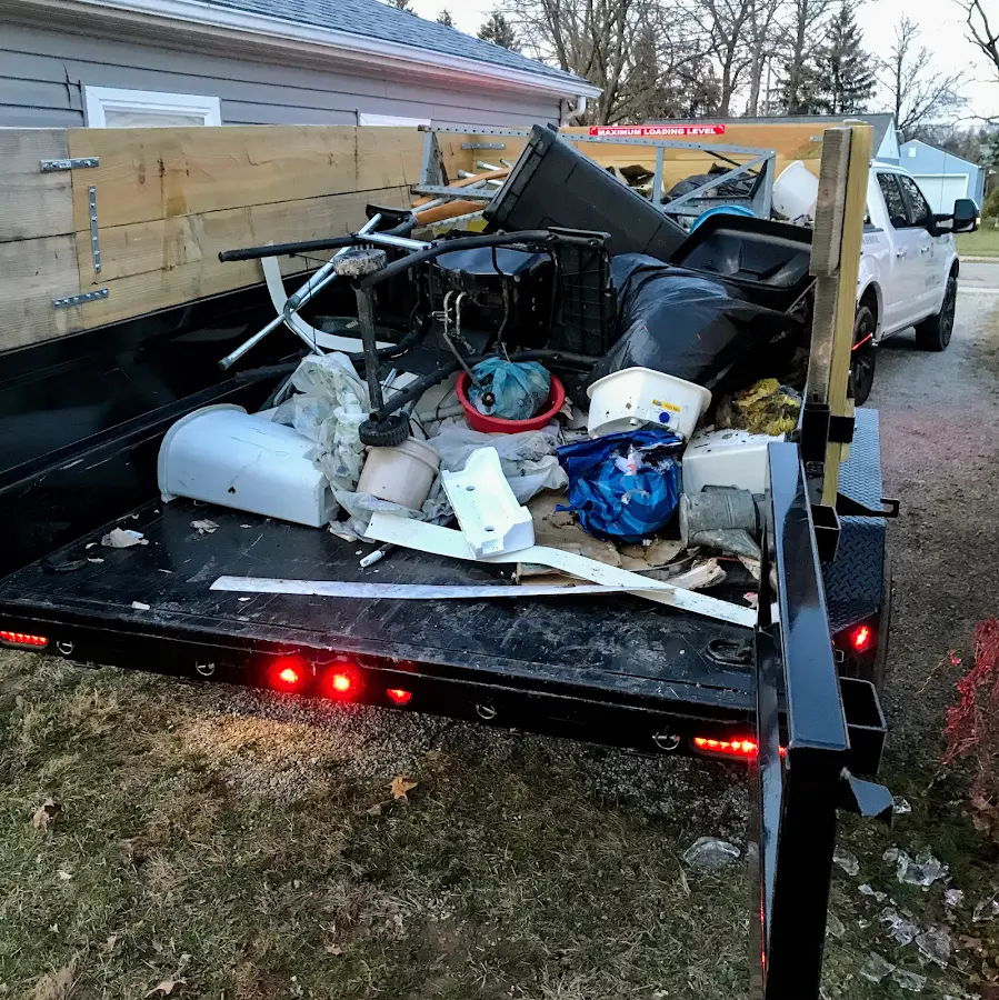 Roll-off dumpster delivered to a residential driveway in Lawnside